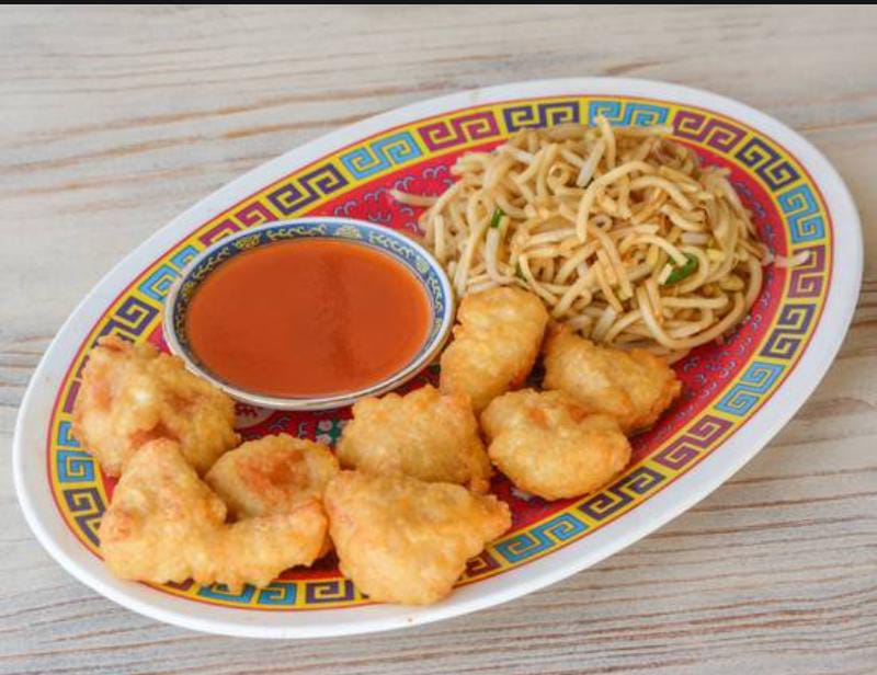 Sweet and sour nuggets with sweet & sour sauce and stir-fried noodles